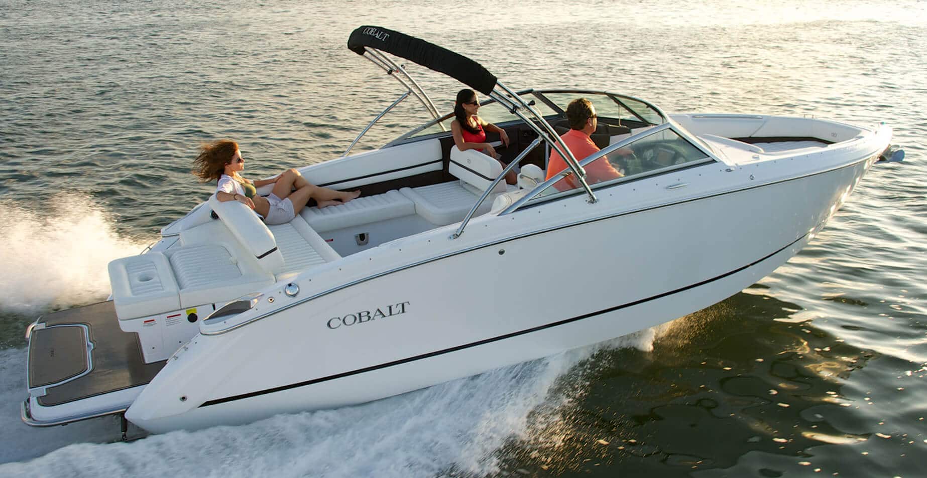 Interior of a luxury yacht with seating and a table