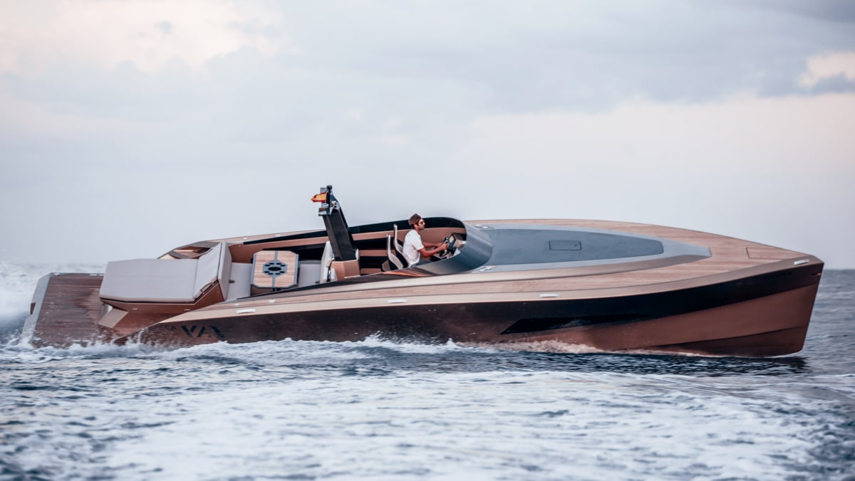 A man driving a motorboat on Lake Geneva